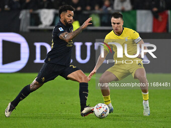 Douglas Luiz of Juventus F.C. and Patric of S.S. Lazio are in action during the 8th day of the Serie A Championship between Juventus F.C. an...