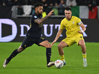 Douglas Luiz of Juventus F.C. and Patric of S.S. Lazio are in action during the 8th day of the Serie A Championship between Juventus F.C. an...