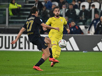 Andrea Cambiaso of Juventus F.C. and Gaetano Castrovilli of S.S. Lazio are in action during the 8th day of the Serie A Championship between...