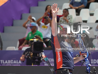 Mike Schloesser of the Netherlands competes against Prathamesh Balchandra Fuge of India (not in picture) during the men's compound bronze me...