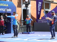 Prathamesh Balchandra Fuge of India and Mike Schloesser of the Netherlands compete during the men's compound bronze medal match on the secon...