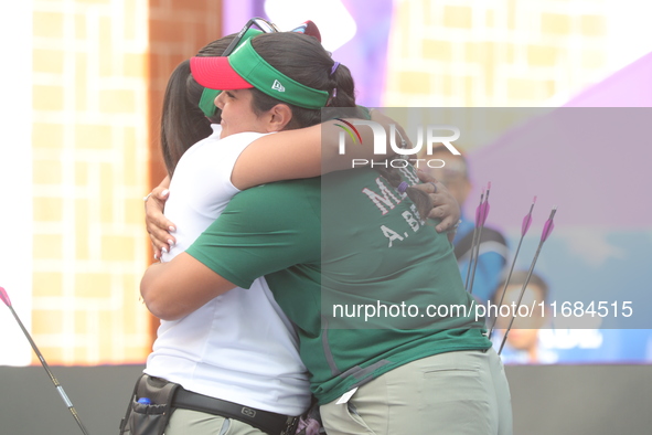 Andrea Maya Becerra of Mexico and Dafne Quintero of Mexico compete during the women's compound bronze medal match on the second day of the T...