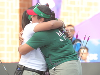 Andrea Maya Becerra of Mexico and Dafne Quintero of Mexico compete during the women's compound bronze medal match on the second day of the T...