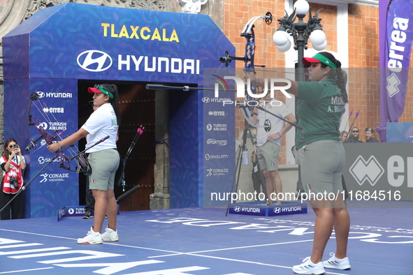 Andrea Maya Becerra of Mexico and Dafne Quintero of Mexico compete during the women's compound bronze medal match on the second day of the T...