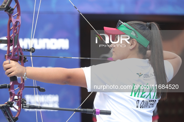 Dafne Quintero of Mexico competes against Andrea Maya Becerra of Mexico (not in picture) during the women's compound bronze medal match on t...