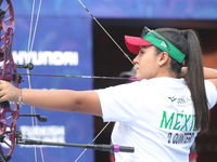 Dafne Quintero of Mexico competes against Andrea Maya Becerra of Mexico (not in picture) during the women's compound bronze medal match on t...