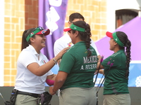 Andrea Maya Becerra of Mexico and Dafne Quintero of Mexico compete during the women's compound bronze medal match on the second day of the T...