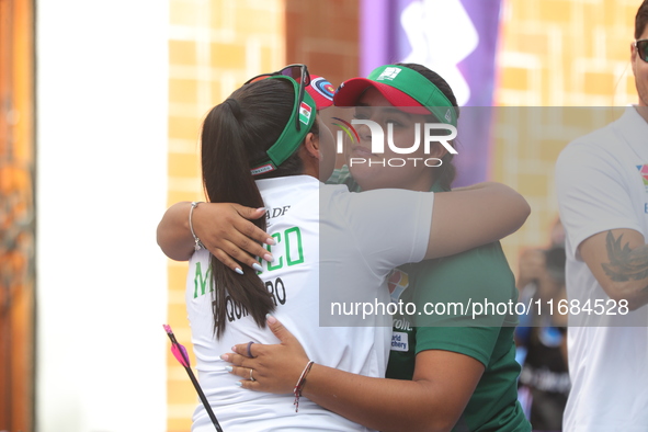 Andrea Maya Becerra of Mexico and Dafne Quintero of Mexico compete during the women's compound bronze medal match on the second day of the T...