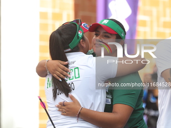 Andrea Maya Becerra of Mexico and Dafne Quintero of Mexico compete during the women's compound bronze medal match on the second day of the T...