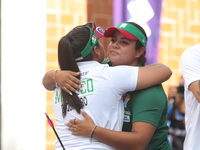 Andrea Maya Becerra of Mexico and Dafne Quintero of Mexico compete during the women's compound bronze medal match on the second day of the T...