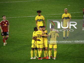 Columbus FC's Malte Amundsen (18) celebrates the winning goal with teammates during the MLS League match between Columbus FC and New York Re...