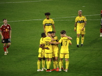 Columbus FC's Malte Amundsen (18) celebrates the winning goal with teammates during the MLS League match between Columbus FC and New York Re...