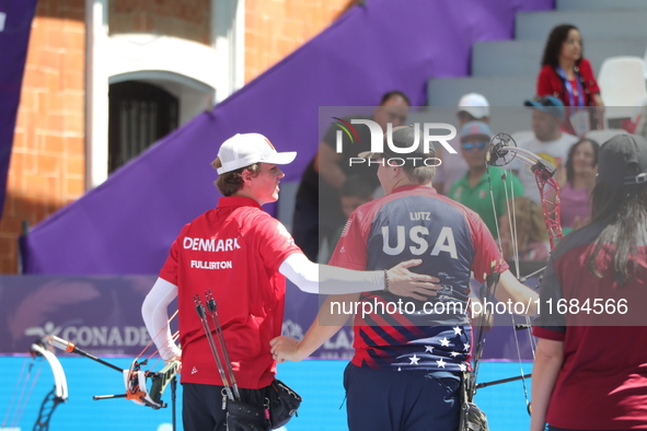 James Lutz of the United States and Mathias Fullerton of Denmark compete during the men's compound gold medal match on the second day of the...