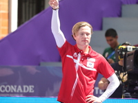 Mathias Fullerton of Denmark competes against James Lutz of the United States (not in picture) during the men's compound gold medal match on...