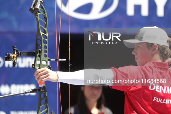 Mathias Fullerton of Denmark competes against James Lutz of the United States (not in picture) during the men's compound gold medal match on...