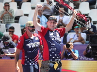 James Lutz of the United States competes against Mathias Fullerton of Denmark (not in picture) during the men's compound gold medal match on...