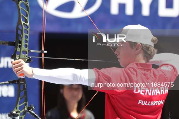 Mathias Fullerton of Denmark competes against James Lutz of the United States (not in picture) during the men's compound gold medal match on...