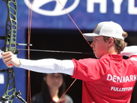 Mathias Fullerton of Denmark competes against James Lutz of the United States (not in picture) during the men's compound gold medal match on...