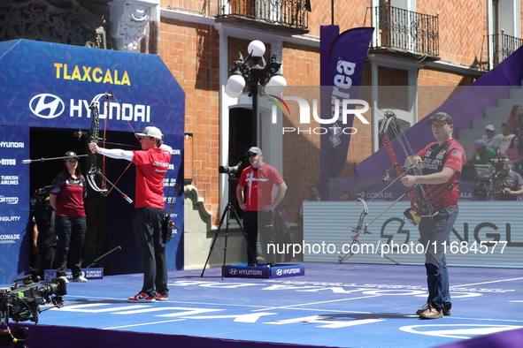 James Lutz of the United States and Mathias Fullerton of Denmark compete during the men's compound gold medal match on the second day of the...