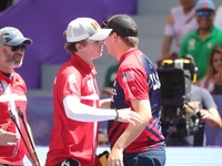 James Lutz of the United States and Mathias Fullerton of Denmark compete during the men's compound gold medal match on the second day of the...