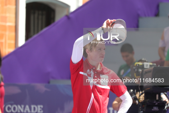 Mathias Fullerton of Denmark competes against James Lutz of the United States (not in picture) during the men's compound gold medal match on...