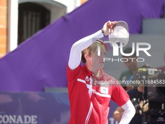 Mathias Fullerton of Denmark competes against James Lutz of the United States (not in picture) during the men's compound gold medal match on...