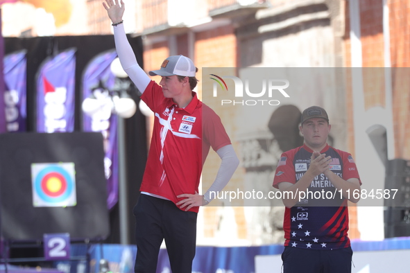 Second place Mathias Fullerton of Denmark and gold medalist James Lutz of the United States stand during the medal ceremony after the men's...