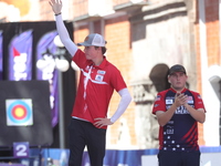 Second place Mathias Fullerton of Denmark and gold medalist James Lutz of the United States stand during the medal ceremony after the men's...