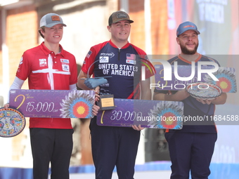 (L-R) Silver medalist Mathias Fullerton of Denmark, gold medalist James Lutz of the United States, and bronze medalist Mike Schloesser of th...