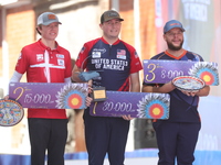 (L-R) Silver medalist Mathias Fullerton of Denmark, gold medalist James Lutz of the United States, and bronze medalist Mike Schloesser of th...