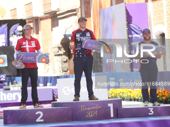 (L-R) Silver medalist Mathias Fullerton of Denmark, gold medalist James Lutz of the United States, and bronze medalist Mike Schloesser of th...