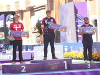 (L-R) Silver medalist Mathias Fullerton of Denmark, gold medalist James Lutz of the United States, and bronze medalist Mike Schloesser of th...