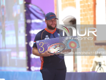 Bronze medalist Mike Schloesser of the Netherlands stands during the medal ceremony on the second day of the Tlaxcala 2024 Archery World Cup...