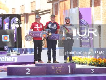 (L-R) Silver medalist Mathias Fullerton of Denmark, gold medalist James Lutz of the United States, and bronze medalist Mike Schloesser of th...