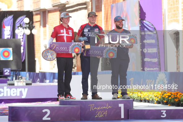 (L-R) Silver medalist Mathias Fullerton of Denmark, gold medalist James Lutz of the United States, and bronze medalist Mike Schloesser of th...