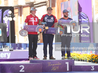 (L-R) Silver medalist Mathias Fullerton of Denmark, gold medalist James Lutz of the United States, and bronze medalist Mike Schloesser of th...