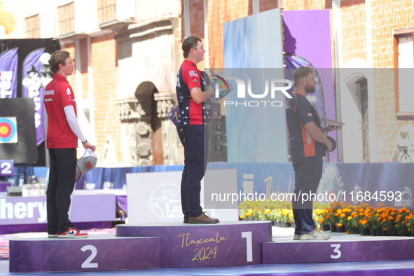 (L-R) Silver medalist Mathias Fullerton of Denmark, gold medalist James Lutz of the United States, and bronze medalist Mike Schloesser of th...