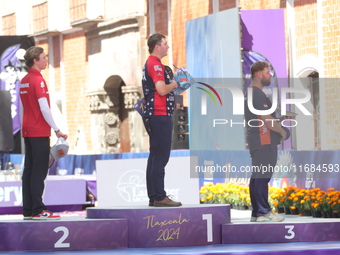 (L-R) Silver medalist Mathias Fullerton of Denmark, gold medalist James Lutz of the United States, and bronze medalist Mike Schloesser of th...