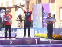 (L-R) Silver medalist Mathias Fullerton of Denmark, gold medalist James Lutz of the United States, and bronze medalist Mike Schloesser of th...