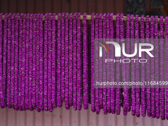 Globe amaranth (Makhamali) flower garlands are ready to sell in the market for the Tihar festival celebration in Bhaktapur, Nepal, on Octobe...