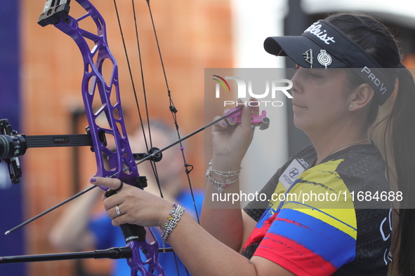 Sara Lopez of Colombia competes against Meeri-Marita Paas of Estonia (not in picture) during the women's compound gold medal match on the se...