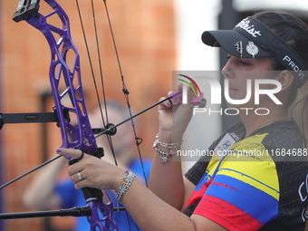 Sara Lopez of Colombia competes against Meeri-Marita Paas of Estonia (not in picture) during the women's compound gold medal match on the se...