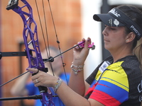 Sara Lopez of Colombia competes against Meeri-Marita Paas of Estonia (not in picture) during the women's compound gold medal match on the se...