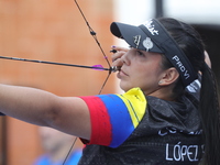 Sara Lopez of Colombia competes against Meeri-Marita Paas of Estonia (not in picture) during the women's compound gold medal match on the se...