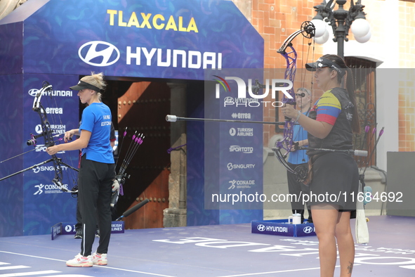 Meeri-Marita Paas of Estonia and Sara Lopez of Colombia compete during the women's compound gold medal match on the second day of the Tlaxca...