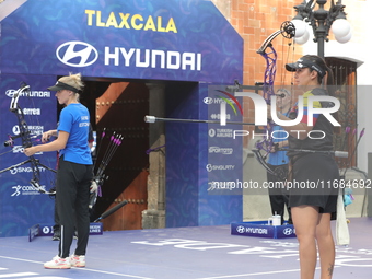 Meeri-Marita Paas of Estonia and Sara Lopez of Colombia compete during the women's compound gold medal match on the second day of the Tlaxca...