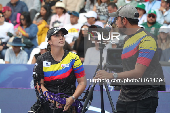 Sara Lopez of Colombia competes against Meeri-Marita Paas of Estonia (not in picture) during the women's compound gold medal match on the se...