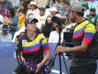 Sara Lopez of Colombia competes against Meeri-Marita Paas of Estonia (not in picture) during the women's compound gold medal match on the se...