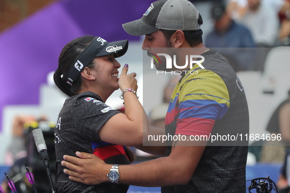 Sara Lopez of Colombia competes against Meeri-Marita Paas of Estonia (not in picture) during the women's compound gold medal match on the se...