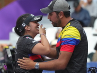 Sara Lopez of Colombia competes against Meeri-Marita Paas of Estonia (not in picture) during the women's compound gold medal match on the se...